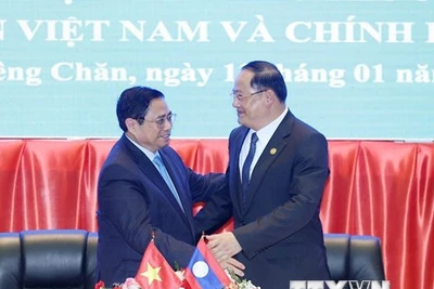 Việt Nam-Lào gìn giữ và làm sâu sắc hơn quan hệ đặc biệt giữa hai nước