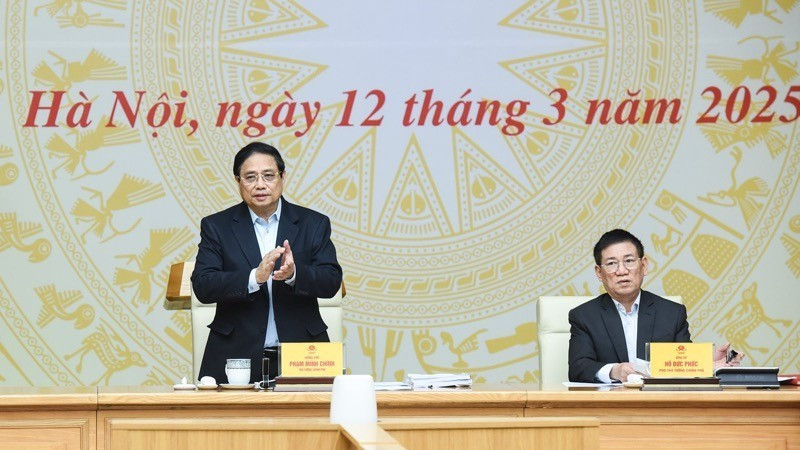Thủ tướng Phạm Minh Chính chủ trì phiên họp lần thứ hai của Ban Chỉ đạo quốc gia về tài chính toàn diện. Ảnh: Trần Hải/Báo Nhân Dân a1-7463-2332-2082-2900.jpg