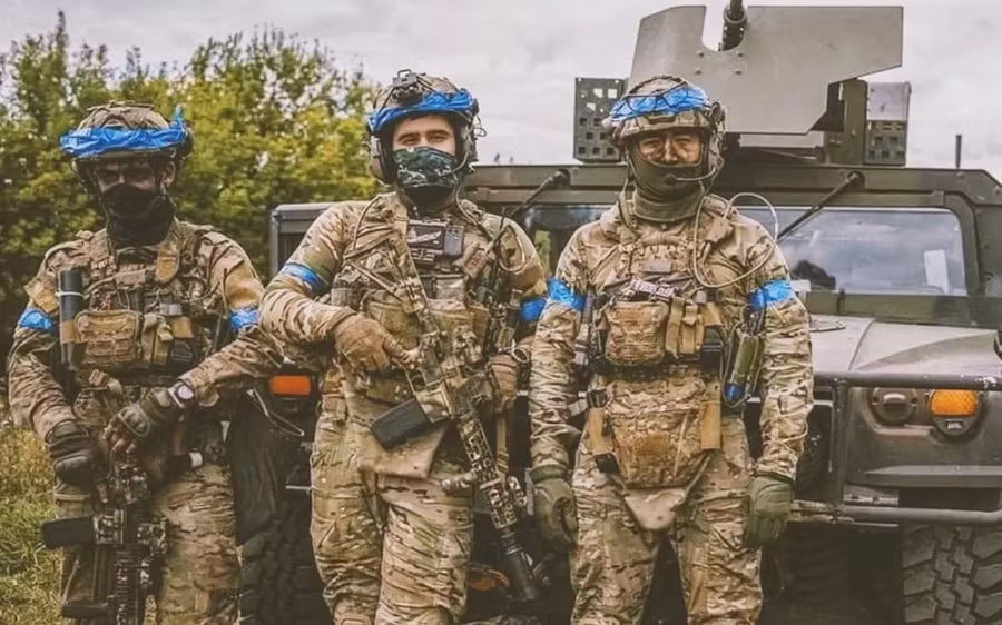 Lính công ty quân sự tư nhân Mỹ FOG trước xe thiết giáp ngày 16-8-2024. Ảnh: FOG