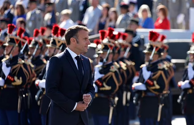 Tổng thống Macron dự lễ duyệt binh kỷ niệm ngày quốc khánh Pháp. Ảnh: Getty Images Tổng thống Macron dự lễ duyệt binh kỷ niệm ngày quốc khánh Pháp. Ảnh: Getty Images