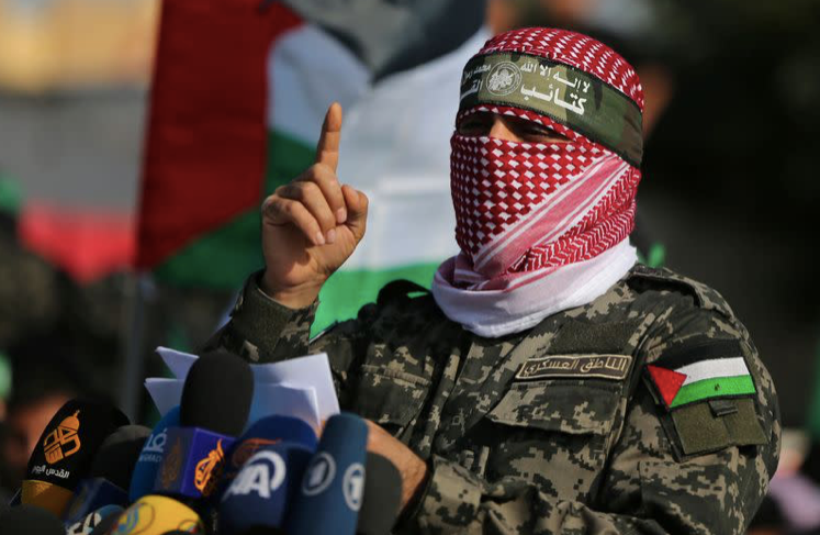 Abu Ubaida, người phát ngôn Lữ đoàn Izz el- Deen al- Qassam phát biểu trong một cuộc diễu hành ở Gaza. Ảnh: Hamas X Abu Ubaida, người phát ngôn Lữ đoàn Izz el- Deen al- Qassam phát biểu trong một cuộc diễu hành ở Gaza. Ảnh: Hamas X