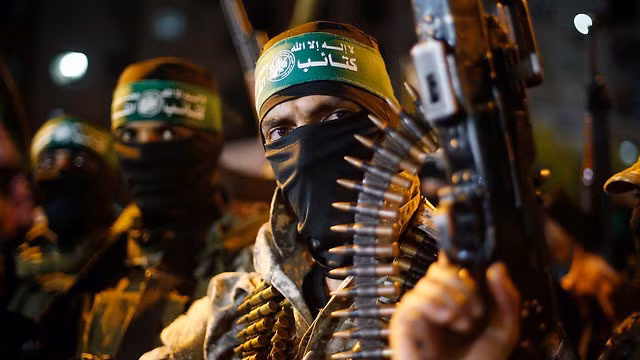 Các tay súng Hamas. Ảnh: Reuters Các tay súng Hamas. Ảnh: Reuters