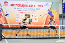 Trong ngày 12-7, các tay vợt thi đấu ở nội dung đôi nam trình 5.2. Ảnh: H.H