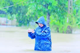 Đi qua những mùa lũ