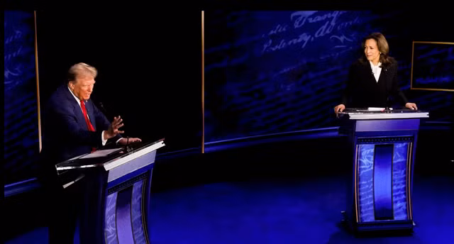 Ông Trump và bà Harris tranh luận hồi tháng 9. Ảnh: Bloomberg