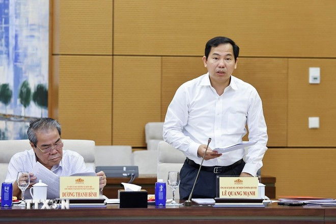 Tổng Thư ký Quốc hội, Chủ nhiệm Văn phòng Quốc hội Lê Quang Mạnh trình bày báo cáo. Ảnh: Doãn Tấn/TTXVN