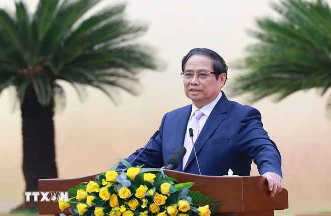 Thủ tướng Phạm Minh Chính phát biểu tại Hội nghị công bố kế hoạch triển khai xây dựng Trung tâm tài chính khu vực và quốc tế tại Việt Nam. (Ảnh: Dương Giang/TTXVN)