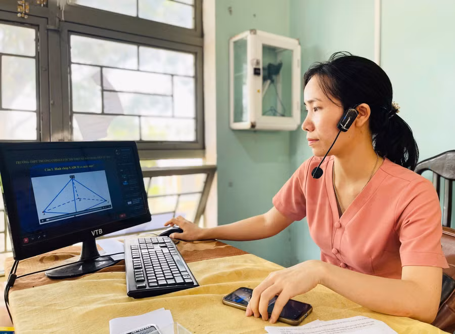co-vu-thi-my-nuong-giao-vien-mon-toan-truong-thpt-truong-chinh-thiet-ke-bai-giang-dien-tu-day-suc-hap-dan-va-cuon-hut-anh-mk.jpg