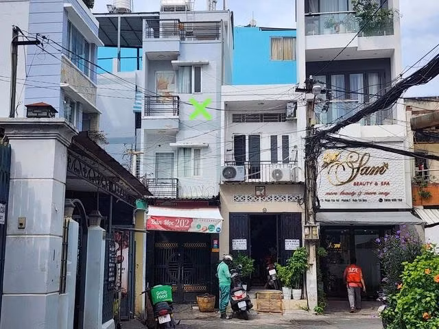 Nhà đất 318/82 Phạm Văn Hai, P.5, Q.Tân Bình bị phù phép từ sở hữu nhà nước sang cá nhân làm chủ (có đánh dấu xanh)