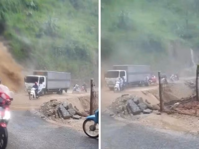 Tài xế dùng xe chắn dòng nước để xe máy đi qua