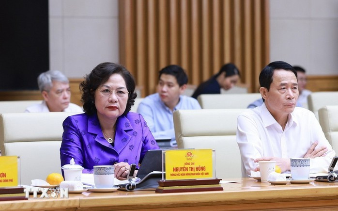 Thống đốc Ngân hàng Nhà nước Nguyễn Thị Hồng và các đại biểu tại cuộc họp. Ảnh: TTXVN Thống đốc Ngân hàng Nhà nước Nguyễn Thị Hồng và các đại biểu tại cuộc họp. Ảnh: TTXVN