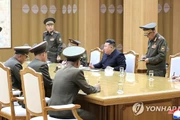 Nhà lãnh đạo Triều Tiên Kim Jong-un tại cuộc họp cùng các quan chức an ninh cấp cao ngày 14-10. Ảnh: KCNA