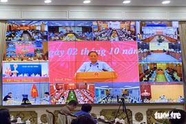 Thủ tướng Phạm Minh Chính chủ trì Hội nghị trực tuyến triển khai mở rộng thí điểm sổ sức khỏe điện tử và cấp phiếu lý lịch tư pháp qua ứng dụng VNeID trên toàn quốc. Ảnh TIẾN QUỐC. Nguồn TTO