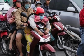 4 trường hợp xe máy chở hai người không bị phạt?