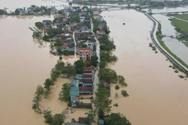 Hà Nội công bố tình huống khẩn cấp do đê vùng 'rốn lũ' Chương Mỹ sạt lở