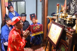 Khôi phục lệ cúng cá ở An Khê. Ảnh: Ngọc Minh