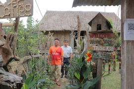 Hvinh Nút làm du lịch cộng đồng. Ảnh: Ngọc Minh
