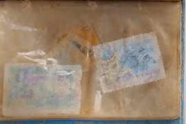 Tìm danh tính liệt sĩ từ dòng tên mờ trên con tem cũ