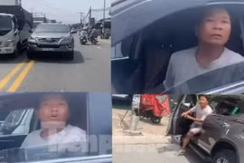Lái xe phạm luật, còn tấn công người dùng điện thoại ghi hình