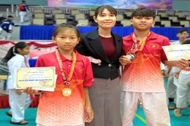 Anh em ruột chinh phục đấu trường Karate