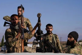 Các thành viên lực lượng an ninh Syria tại thành phố Sweida hồi tháng 7. Ảnh: Reuters