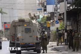 Các lực lượng Israel được triển khai tại thành phố Nablus, Bờ Tây. (Ảnh: THX/TTXVN)