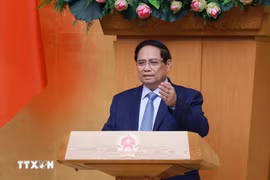 Thủ tướng Phạm Minh Chính chủ trì họp đánh giá kết quả vận hành mô hình chính quyền địa phương hai cấp. (Ảnh: Dương Giang/TTXVN)