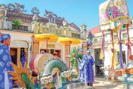 Lễ tế thu tại đình làng Hữu Thành diễn ra với các nghi lễ cổ truyền. Ảnh: Ngọc Nhuận