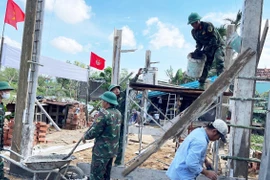 Quân đoàn 34 gấp rút dựng mái ấm cho dân