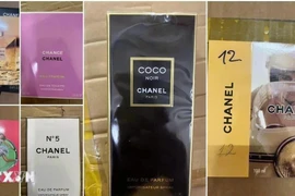 Triệt phá đường dây buôn bán nước hoa giả cực lớn tại Thành phố Hồ Chí Minh