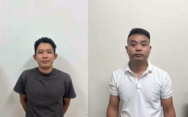 Hai người đàn ông nước ngoài bị bắt vì hành vi chiếm đoạt tài sản. Ảnh: C.A