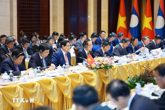 Thủ tướng Phạm Minh Chính phát biểu tại Kỳ họp lần thứ 48 Ủy ban liên Chính phủ về hợp tác song phương Việt Nam-Lào. Ảnh: Dương Giang/TTXVN