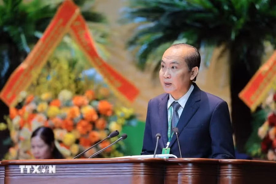 Đồng chí Phan Như Nguyện, Phó Chủ tịch Thường trực Ban Chấp hành Trung ương Hội Nông dân Việt Nam báo cáo tóm tắt kết quả thực hiện Nghị quyết. Ảnh: Lê Đông/ TTXVN