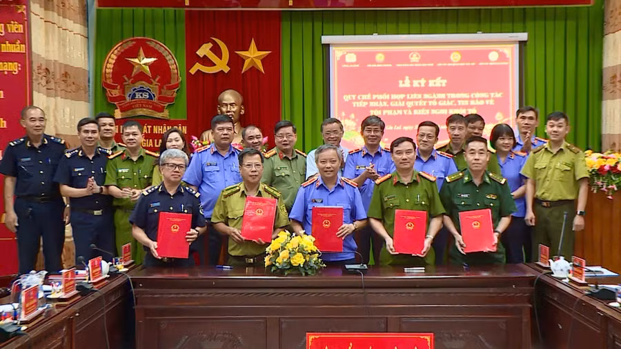 ky-ket-quy-che-phoi-hop-lien-nganh-cong-tac-tiep-nhan-giai-quyet-to-giac-tin-bao-ve-toi-pham-va-kien-nghi-khoi-to.jpg