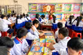 Gần 100 học sinh Trường THCS Phạm Hồng Thái (phường Pleiku) tham gia ngoại khóa đọc sách sáng 22-9. Ảnh: P.D