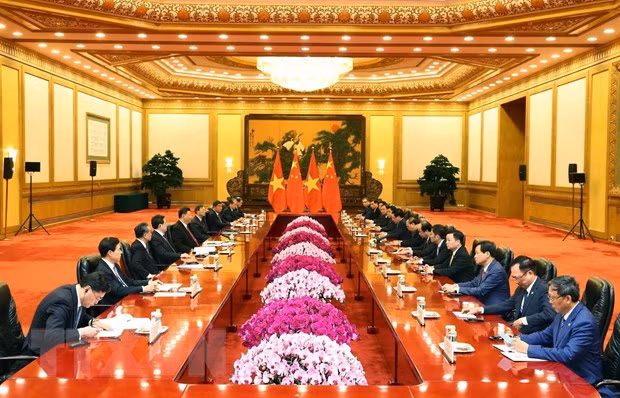 Thủ tướng Nguyễn Xuân Phúc hội kiến Tổng Bí thư, Chủ tịch nước Trung Quốc Tập Cận Bình. (Ảnh: Thống Nhất/TTXVN)