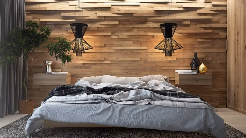 Đèn làm tăng tính nghệ thuật cho bức tường gỗ.