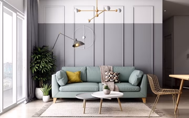 Ghế sofa màu xanh bạc hà mang đến một không gian tiếp khách nhẹ nhàng và ấm cúng.
