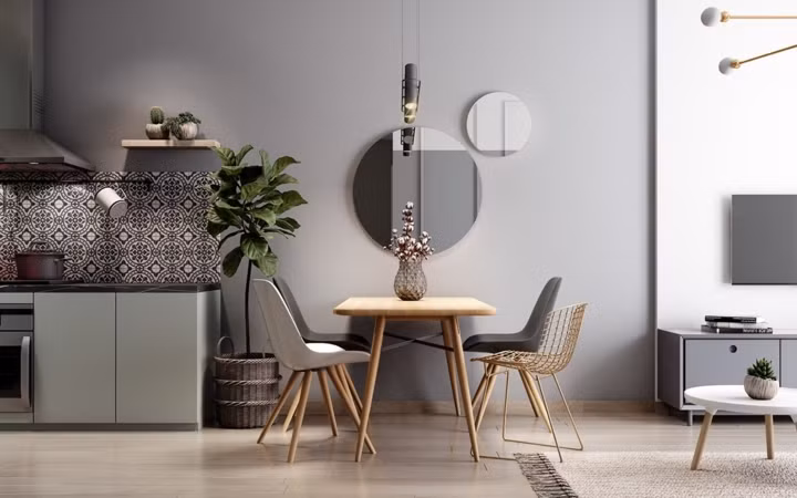 Dù cuộc sống bận rộn nhưng chủ nhân vẫn không bỏ quên bữa ăn cuối ngày tạo sự gắn kết giữa các thành viên. Đèn mặt dây chuyền và bàn ăn gỗ đơn giản nhưng gần gũi kéo mọi người xích lại gần nhau.