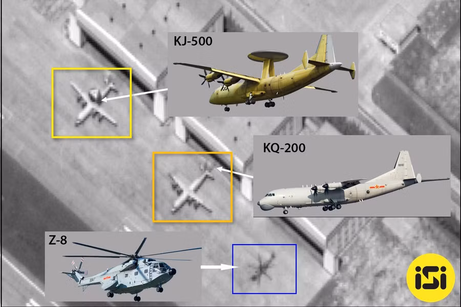 Hình chụp vệ tinh do ISI công bố năm 2020 cho thấy các máy bay quân sự KJ-500, KQ-200 và Z-8 hiện diện tại bãi đá Chữ Thập - Ảnh: ISI