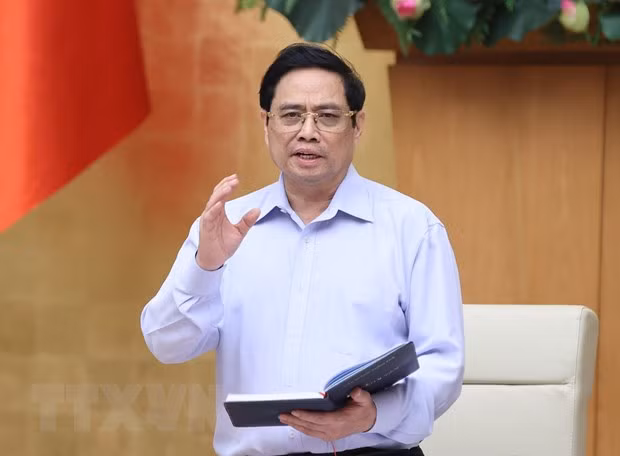 Thủ tướng Phạm Minh Chính chủ trì cuộc họp khẩn của Chính phủ với Ban Chỉ đạo Quốc gia phòng, chống COVID-19 để nghe báo cáo tình hình dịch bệnh, trên cơ sở đó xem xét, quyết định những giải pháp mạnh mẽ hơn, quyết liệt hơn trước những diễn biến dịch phức tạp hiện nay. (Ảnh: Dương Giang/TTXVN)