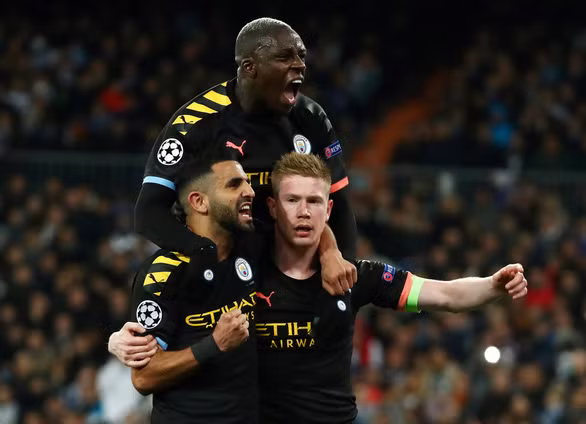  Niềm vui của các cầu thủ Man City khi ghi bàn vào lưới Real Madrid - Ảnh: REUTERS