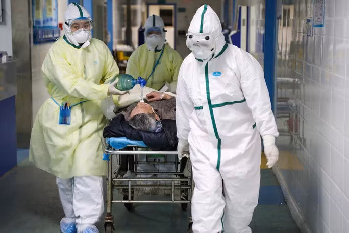 Kể từ khi bùng phát tại TP Vũ Hán - Trung Quốc, Covid-19 lan nhanh và xa. Ảnh: Reuters