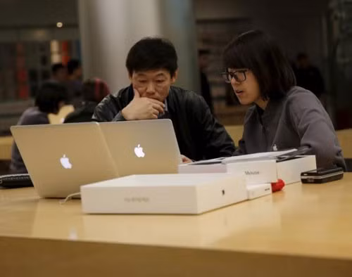  Một cửa hàng của hãng Apple ở thủ đô Bắc Kinh - Trung Quốc Ảnh: REUTERS