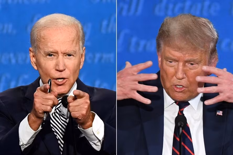  Tổng thống Donald Trump và ứng viên Joe Biden bước vào cuộc tranh luận cuối cùng. Ảnh: AFP