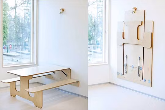 Bộ bàn ăn bằng ván ép có thể được gắn vào tường khi không cần dùng đến - một ý tưởng tuyệt vời cho không gian nhỏ