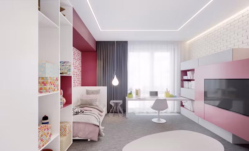 Căn phòng có mầu hồng pha trắng làm chủ đạo. Chiếc tivi được kê đối diện với giường ngủ sẽ giúp trẻ vừa nằm vừa xem các chương trình truyền hình.