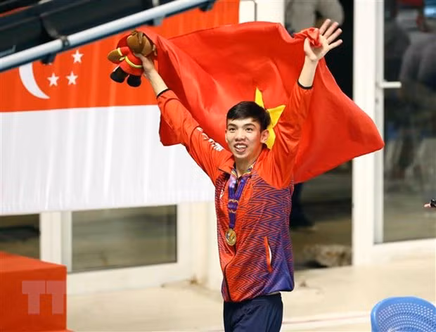 Vận động viên Nguyễn Huy Hoàng giành Huy chương Vàng nội dung 200m bơi bướm nam với thành tích 1 phút 58 giây 81. Ảnh: TTXVN