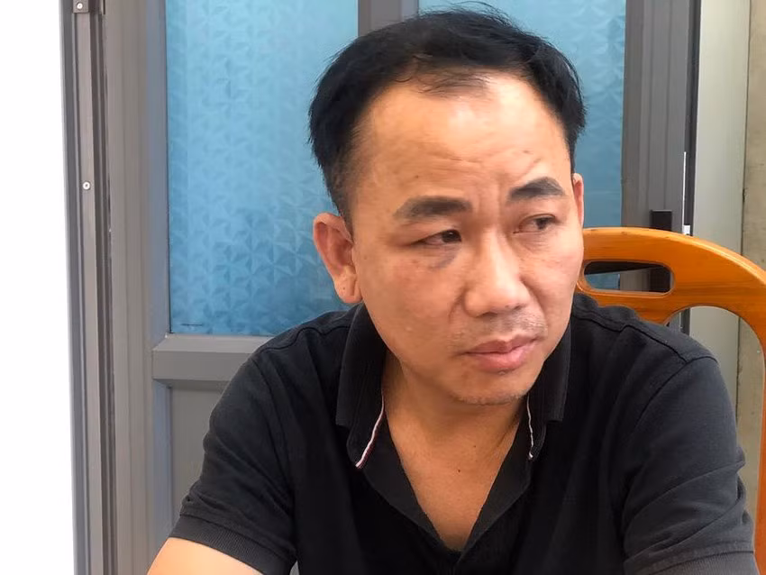 Tài xế Phạm Văn Nam sau khi lái ô tô tông chết người đã ra đầu thú tại cơ quan điều tra. Ảnh: H.L