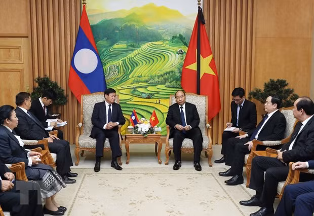 Thủ tướng Nguyễn Xuân Phúc và Thủ tướng Lào Thongloun Sisoulith hội đàm hẹp hồi tháng 8/2020. (Ảnh: Lâm Khánh/TTXVN) Thủ tướng Nguyễn Xuân Phúc và Thủ tướng Lào Thongloun Sisoulith hội đàm hẹp hồi tháng 8/2020. (Ảnh: Lâm Khánh/TTXVN)